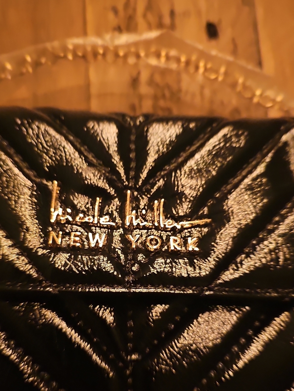 Nicole Miller Black Quilted Crossbody with Gold Logo